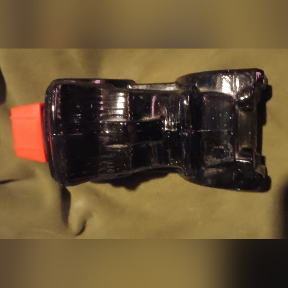 Avon Black and Red Car Shaped Bottle